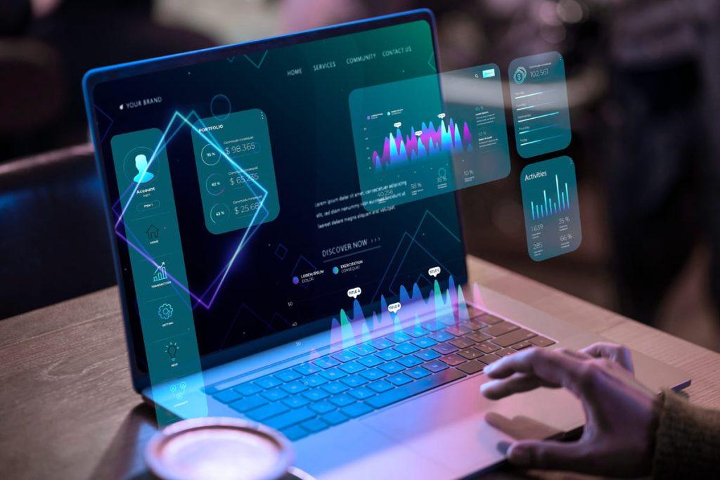pessoa usando um BI automatizado no computador, analisando o business intelligence do seu negócio.