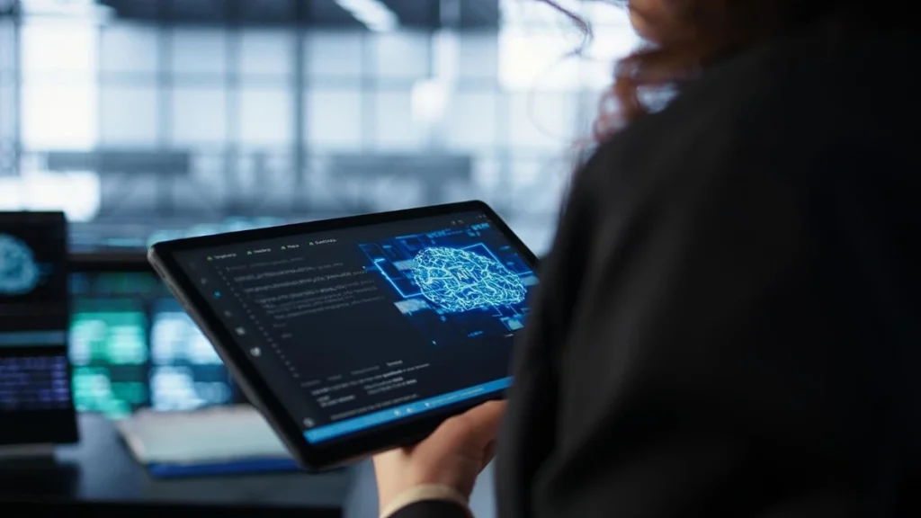 Profissional utiliza tablet com representação de inteligência artificial, ilustrando os temas de tecnologia e IA discutidos no World Summit AI.